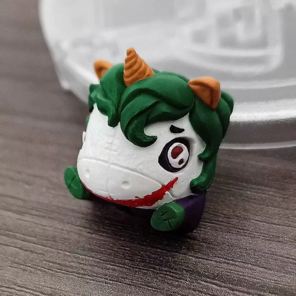 Charming clown-themed unicorn keycap with whimsical and cute design details