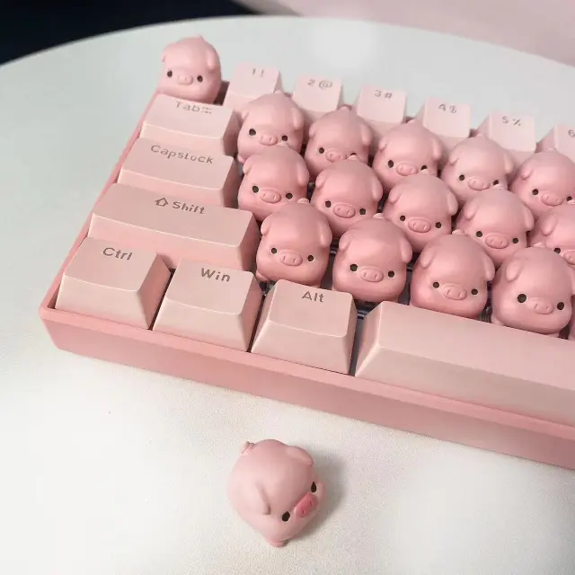 Adorable and captivating pig-themed keyboard, perfect for infusing a playful vibe into your computer setup.
