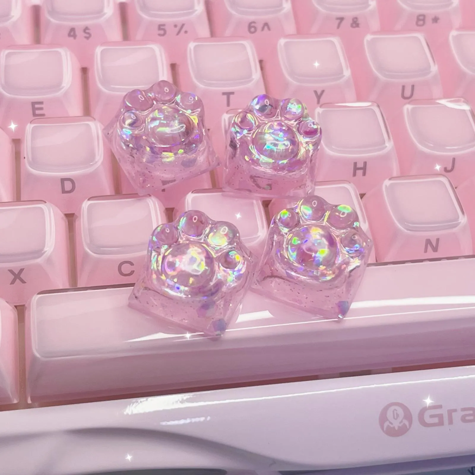 translucent-pink-sequin-cat-paw-keycaps-display