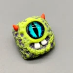 big-eyed-monster-keycaps-black-green-teeth