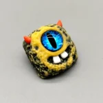 big-eyed-monster-keycaps-black-yellow-teeth