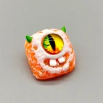 big-eyed-monster-keycaps-orange-white-teeth