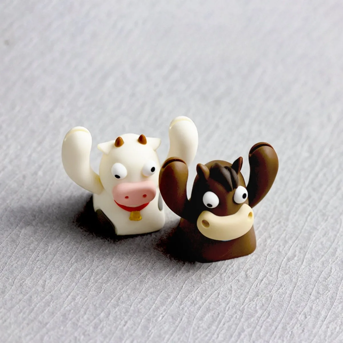 cow-horse-holding-signs-keycaps-front