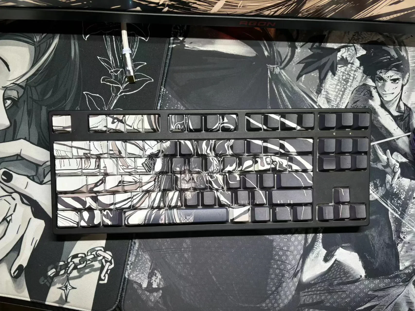 Multiple angles of the epic hand-sculpted Attack on Titan artisan keycap set, showcasing its intricate beast-form details and stunning translucent.