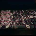 Epic Attack on Titan beast-form artisan keycap set, featuring translucent details that glow with stunning backlighting, showcasing its stunning design.