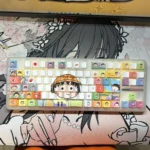 Chibi Maruko-chan keycap set showcases vibrant, side-engraved characters, enhanced by imaginative backlighting for a premium and playful touch.