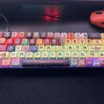 Epic Demon Slayer keycaps set showcasing iconic side-lit legends from various playful angles. Features vibrant shine-through effects and dynamic design.