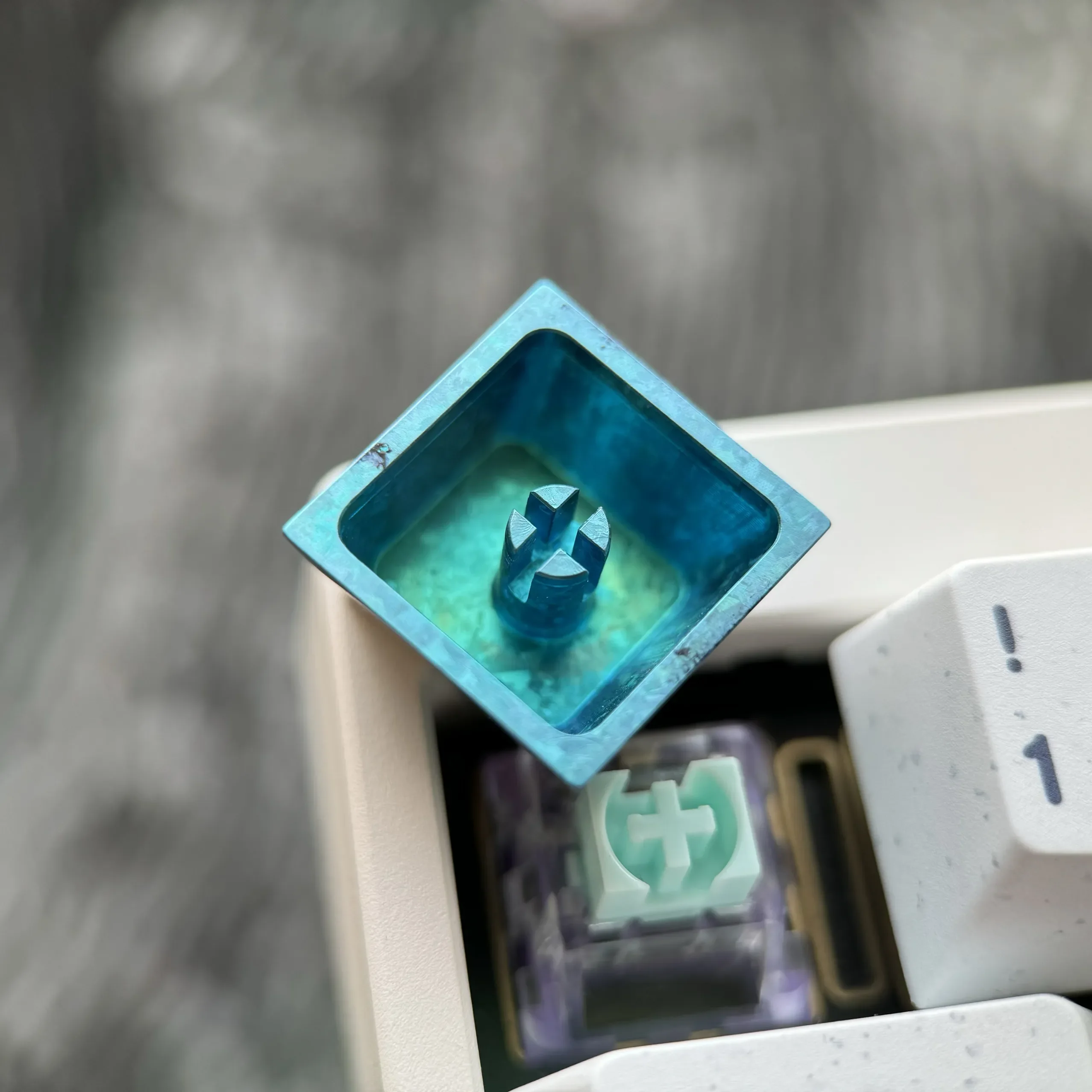 Frieren titanium keycap gallery in stunning ice crystal blue. Explore premium titanium alloy craftsmanship from multiple angles, capturing Frieren's personal.