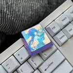 These premium Ganyu titanium alloy keycaps, a masterpiece of craftsmanship, show off the luminous blue titanium alloy and exquisite famous character art, possessing a flawless metallic texture.