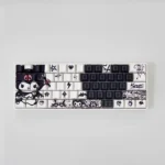 Artistic gallery showcasing Iconic Kuromi Side Engraved Keycaps. Multiple views highlight the sleek black transparent design and rebellious Kuromi design.