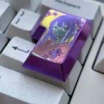Multiple angles of the premium Anodized Titanium Hoshino Ai keycap, showcasing its vibrant anime design and luxurious metallic sheen.