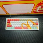 Playful McDonald's Themed keycap Set gallery featuring iconic red and yellow pop culture designs from diverse angles. Embrace playful nostalgia with this unique design.