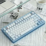 Exquisite Monsoon Keycap Set. Serene blue Cherry keycaps capture tranquil rain and flowing water patterns, an artistic statement for any keyboard.