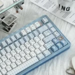 Exquisite Monsoon Keycap Set gallery. Serene deep blues, gentle whites, and subtle grays evoke tranquil rain and flowing water patterns.