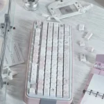 Night Walking keycap set in a collection, displayed from various angles. Showcasing their unique soft pastel aesthetic, cute Asian-inspired.