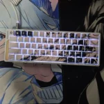 Playfully explore the full Trafalgar Law keycap set, featuring iconic side-engraved designs and vibrant backlight legends from various angles.