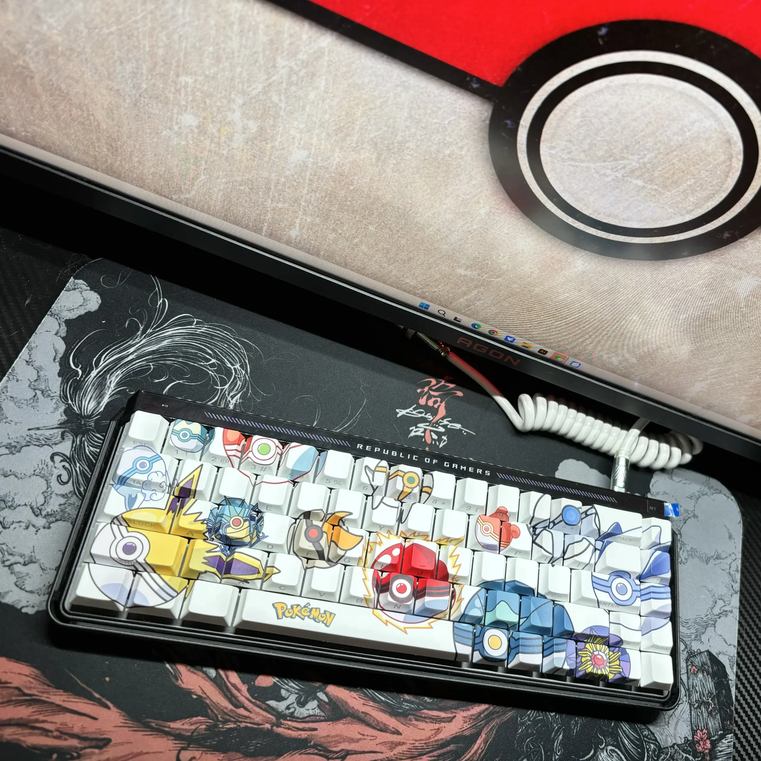 A full set of premium side-engraved Pokeball Keycap Set displayed from various perspectives, showcasing the subtle, iconic designs and clean aesthetic.