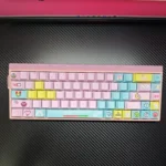 Vibrant retro pixel art keycap set showcasing charming 8-bit front-engraved designs, bringing a playful classic gaming aesthetic to your desktop setup.