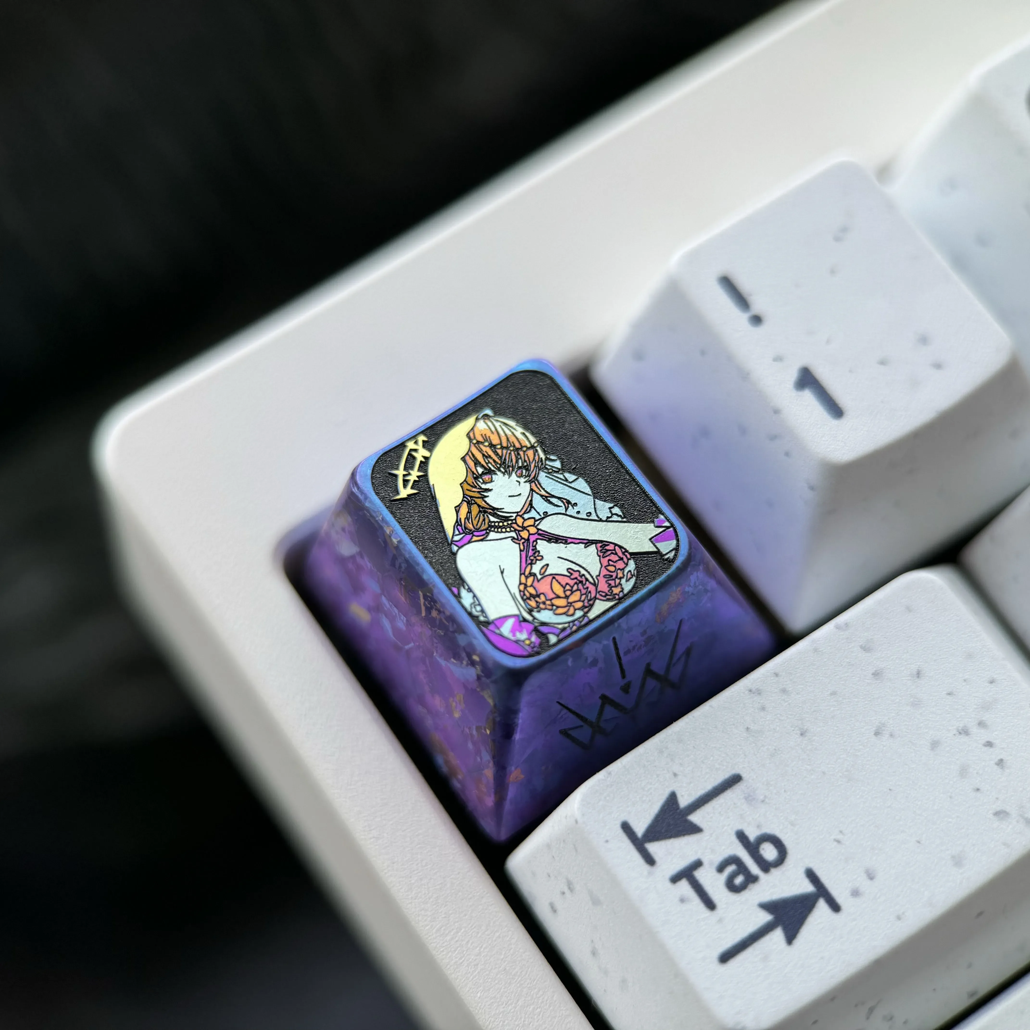 Close-up views of the exclusive Snowbreak Fenny Titanium Alloy Keycap, showcasing its anime-inspired design, icy blue metallic finish, and intricate