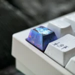 Premium Titanium Snowbreak Lyfe Keycap. Images highlight Lyfe's icy blue, futuristic anime aesthetic and durable artistic quality.