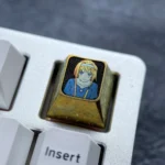 A premium Alice Zuberg Inspired Titanium ESC Keycap designed in a luxurious ice crystal gold artistic, featuring its enchanting custom design for your setup.