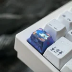 Detailed Yanami Akina Titanium Anime Keycap images, highlighting the vibrant character art and premium titanium finish from various artistic.