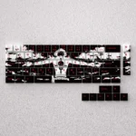 A vibrant display of iconic Portgas D. Ace PBT keycaps, embodying the fiery spirit of the One Piece anime hero.