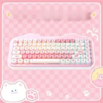 A playful pastel C75 tri-mode custom keyboard brightly illuminated by vibrant RGB lighting, highlighting its hot-swappable design.