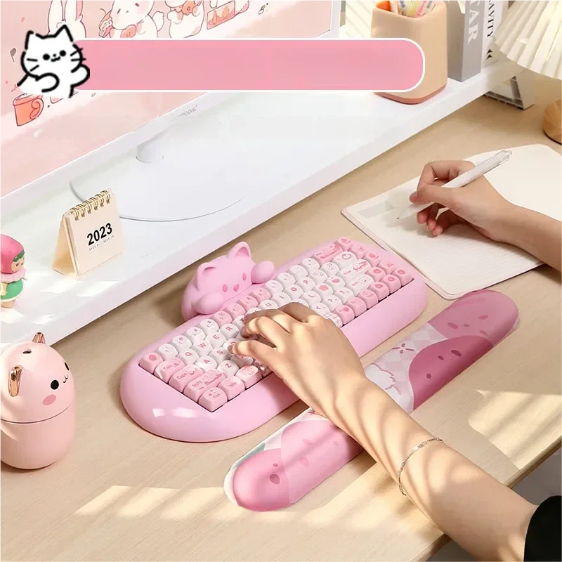 A gallery of images showcasing the adorable cat ergonomic wrist rest, highlighting its soft silicone comfort and playful keyboard support your setup.