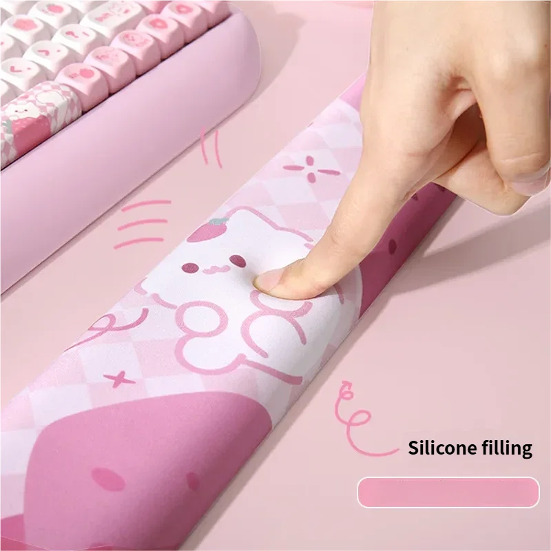 Gallery of the adorable cat wrist rest from multiple angles, showcasing its soft ergonomic silicone comfort for keyboard support.