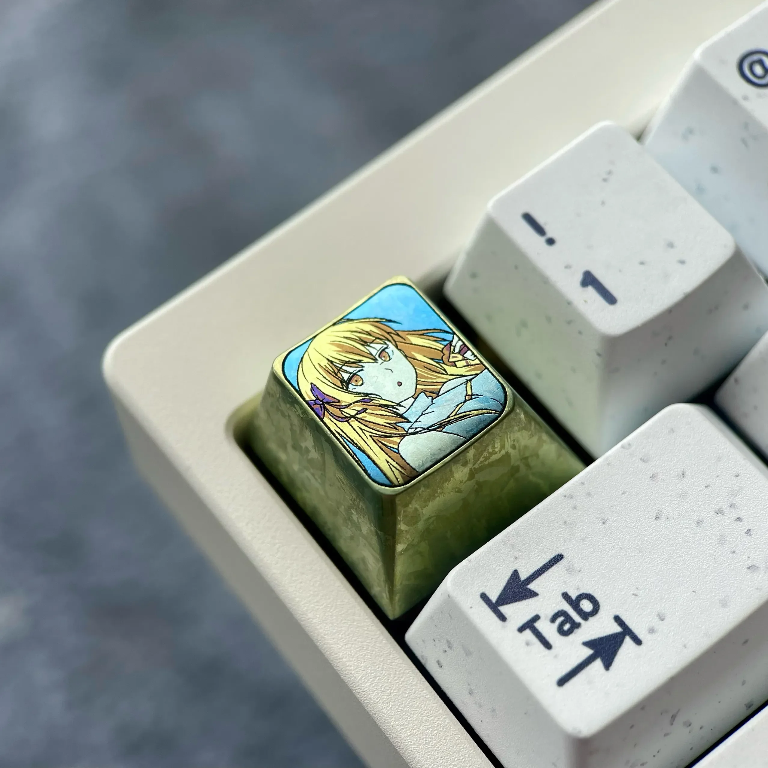 Gallery views of the Aiz Wallenstein Keycap, anodized, highlighting its sleek metallic form, unique design, and premium deisgn.