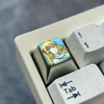 Gallery views of the Aiz Wallenstein Keycap, revealing its unique industrial-artistic design and vibrant anodized orange finish from multiple design.