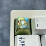 Vibrant Aiz Wallenstein Keycap, showcasing its sleek metallic form and unique industrial-artistic design.