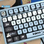 A playful collection of vibrant K-On! Akiyama Mio PBT pudding keycaps set, highlighting their translucent RGB-ready sides and detailed anime art.