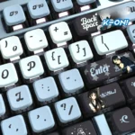 Vibrant K-On! Akiyama Mio PBT pudding keycaps set from various angles, highlighting translucent sides and playful anime art for custom keyboards.