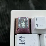 Exclusive Sumireko Sanshokuin anime titanium keycap in shimmering ice crystal purple, showcasing vibrant character art for a premium mechanical keyboard.