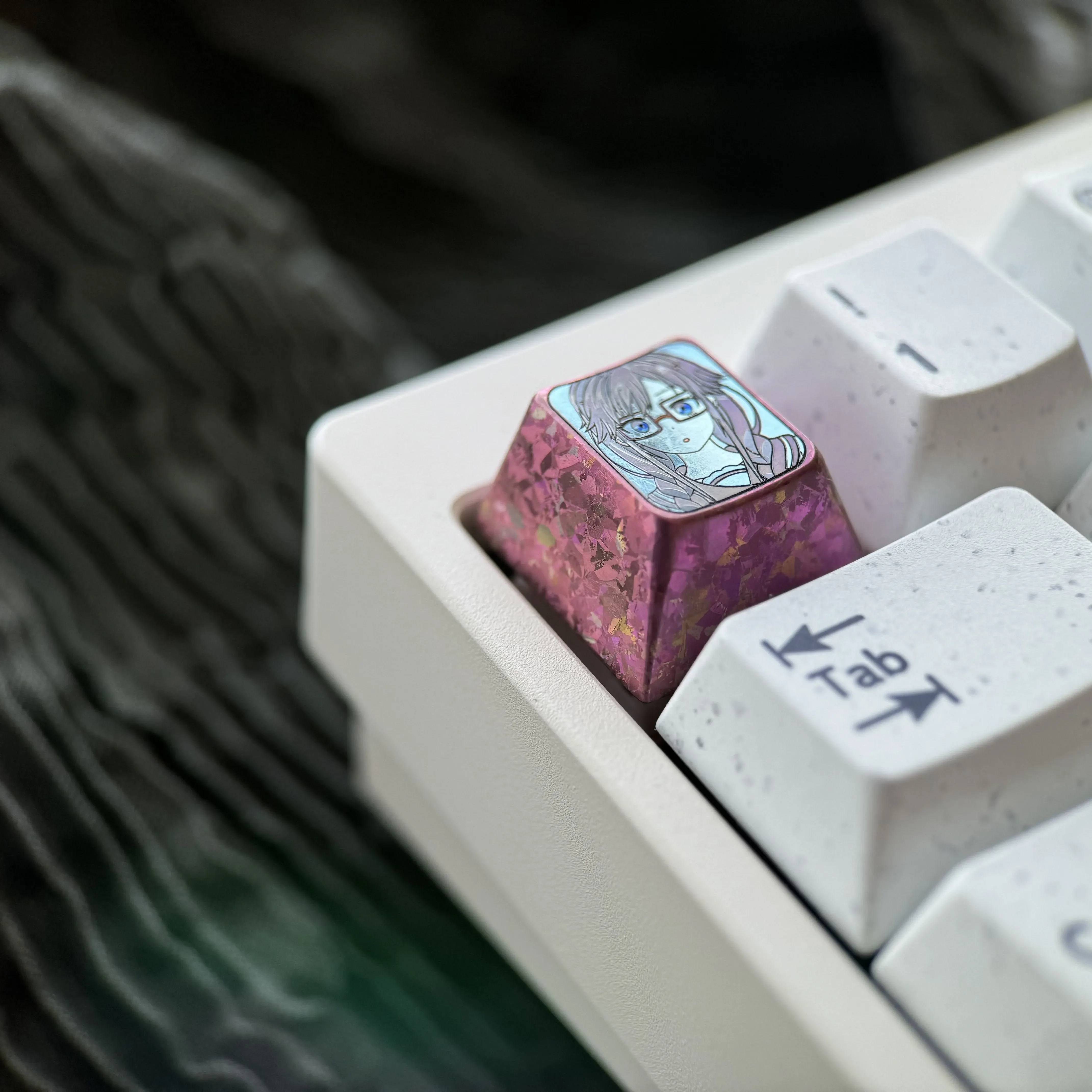 Product gallery of the exclusive Sumireko Sanshokuin Anime Titanium Keycap, featuring its ice crystal purple finish and vibrant anime character art.