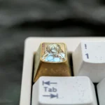 Gallery of the premium Valiant Sword Maiden anime titanium keycap, revealing its vibrant metallic icy crystal finish and intricate collectible design.