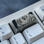 Anya Titanium Keycap with premium intricate Anya Forger engraving and sophisticated dark grey titanium finish. Ideal for Spy x Family keyboards.