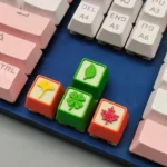 Gallery of the handmade resin leaf artisan keycap, revealing its delicate green foliage suspended in clear resin from various angles, an artistic design.