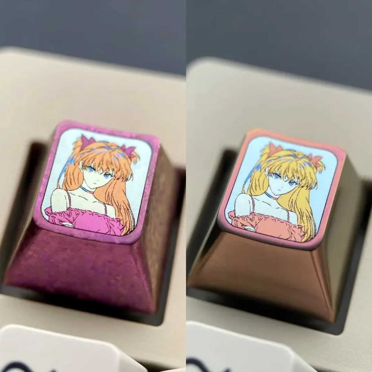 Vibrant pink anodized titanium Asuka ESC keycap for mechanical keyboards, showcasing iconic character design as a premium centerpiece.