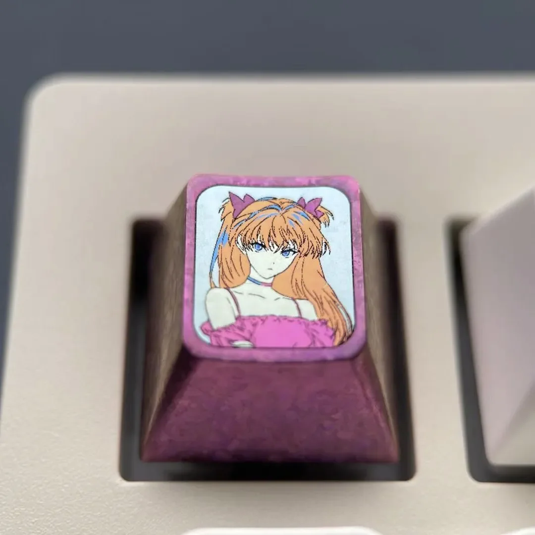 Premium pink anodized titanium Asuka ESC keycap views, highlighting its vibrant iconic design and superior finish for mechanical keyboards.