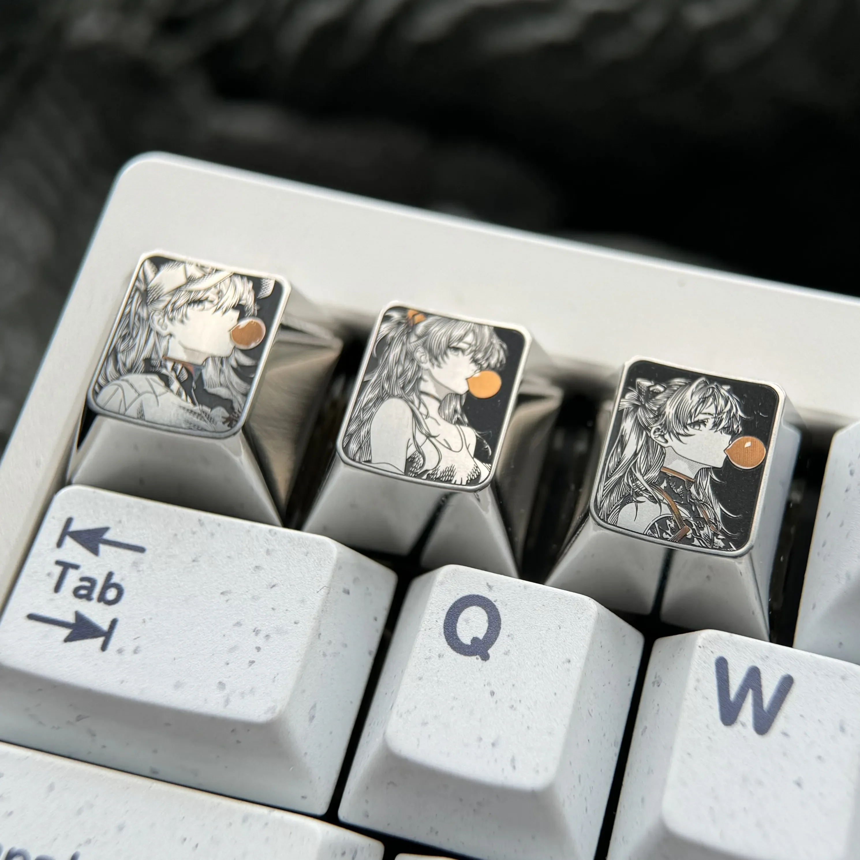 Iconic Asuka titanium keycap gallery showcasing premium pointillist artistry and intricate dreamy bubble design from multiple perspectives.