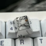 Iconic Asuka titanium keycap showcasing premium pointillist artistry, with Asuka in a dreamy bubble scene. A meticulously crafted artisan ESC keycap.