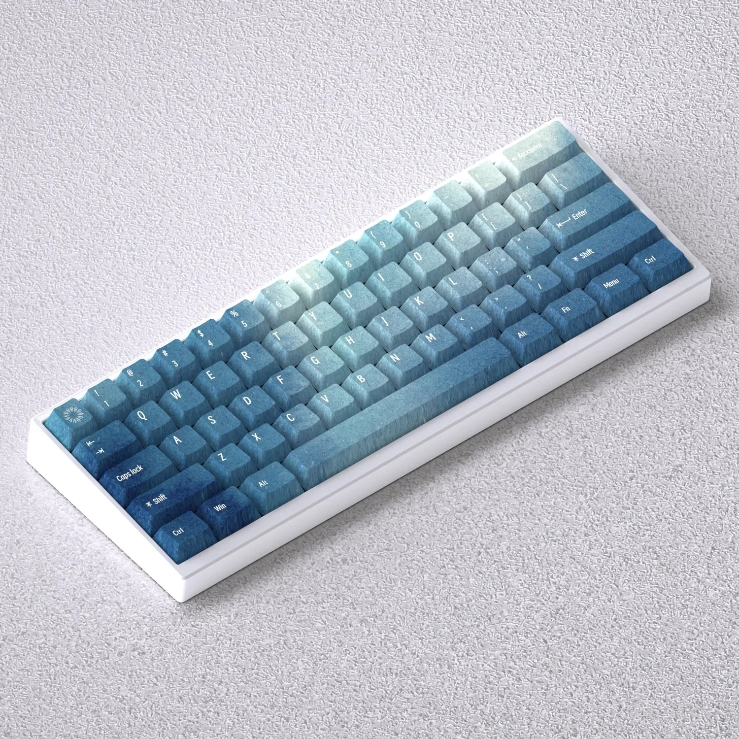 Celestial Aurora Borealis PBT keycap set displayed from various angles, revealing mystical deep blue and emerald gradients.