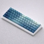 Vibrant Aurora Borealis PBT keycaps set in mystical blue, and green gradients. This celestial set transforms your keyboard.