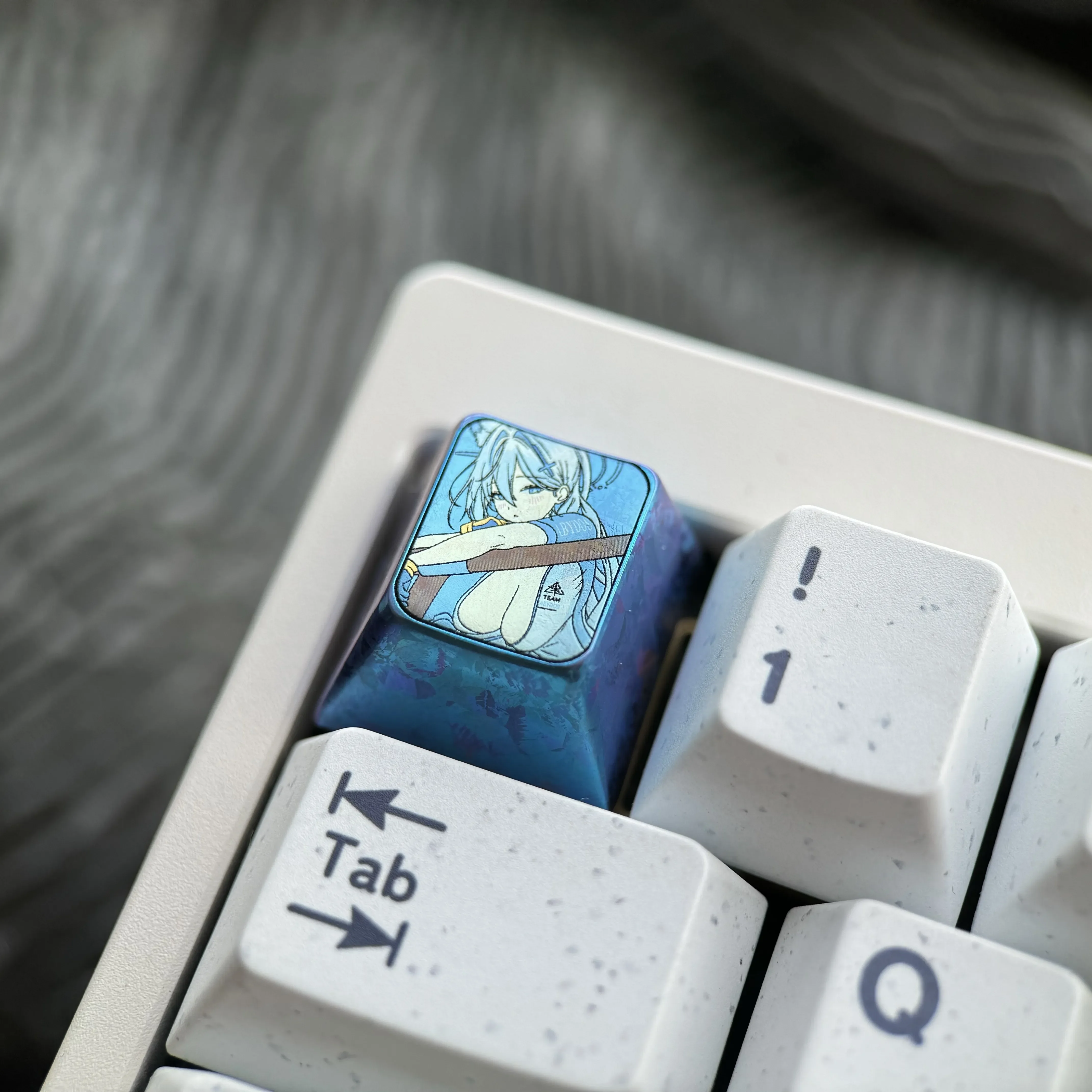 Multiple views of the premium titanium Blue Archive Shiroko artisan ESC keycap, highlighting its vibrant design and collector-grade craftsmanship.