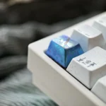 Multiple angles of the premium titanium Blue Archive Shiroko artisan keycap, showcasing its vibrant design and collector-grade craftsmanship.