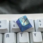 Vibrant Blue Archive Shiroko premium titanium artisan ESC keycap shown from multiple angles, highlighting collector-grade design and craftsmanship.