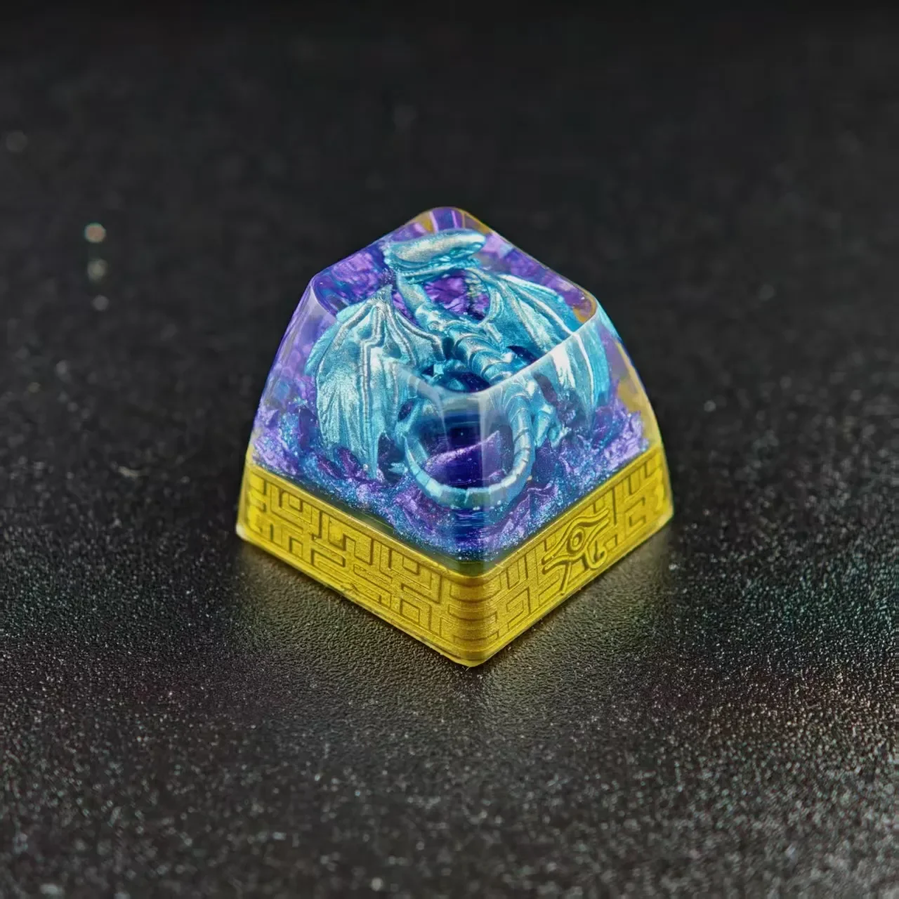 Angled views of the iconic Blue-Eyes White Dragon translucent resin keycap, showcasing intricate mythical details and vibrant glow for artistic feel.